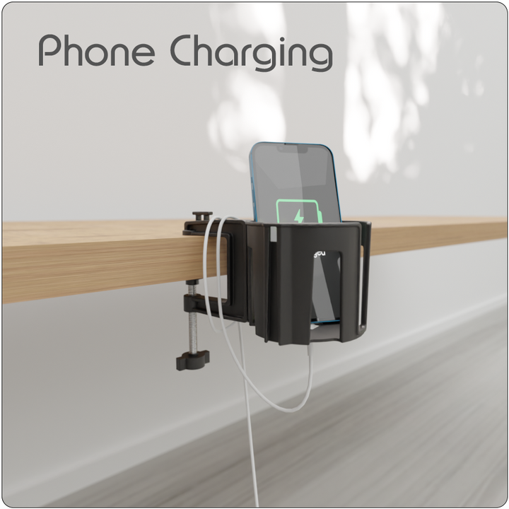 Cup-Holster used as a phone stand on a desk, holding a smartphone upright with charging cables organized.